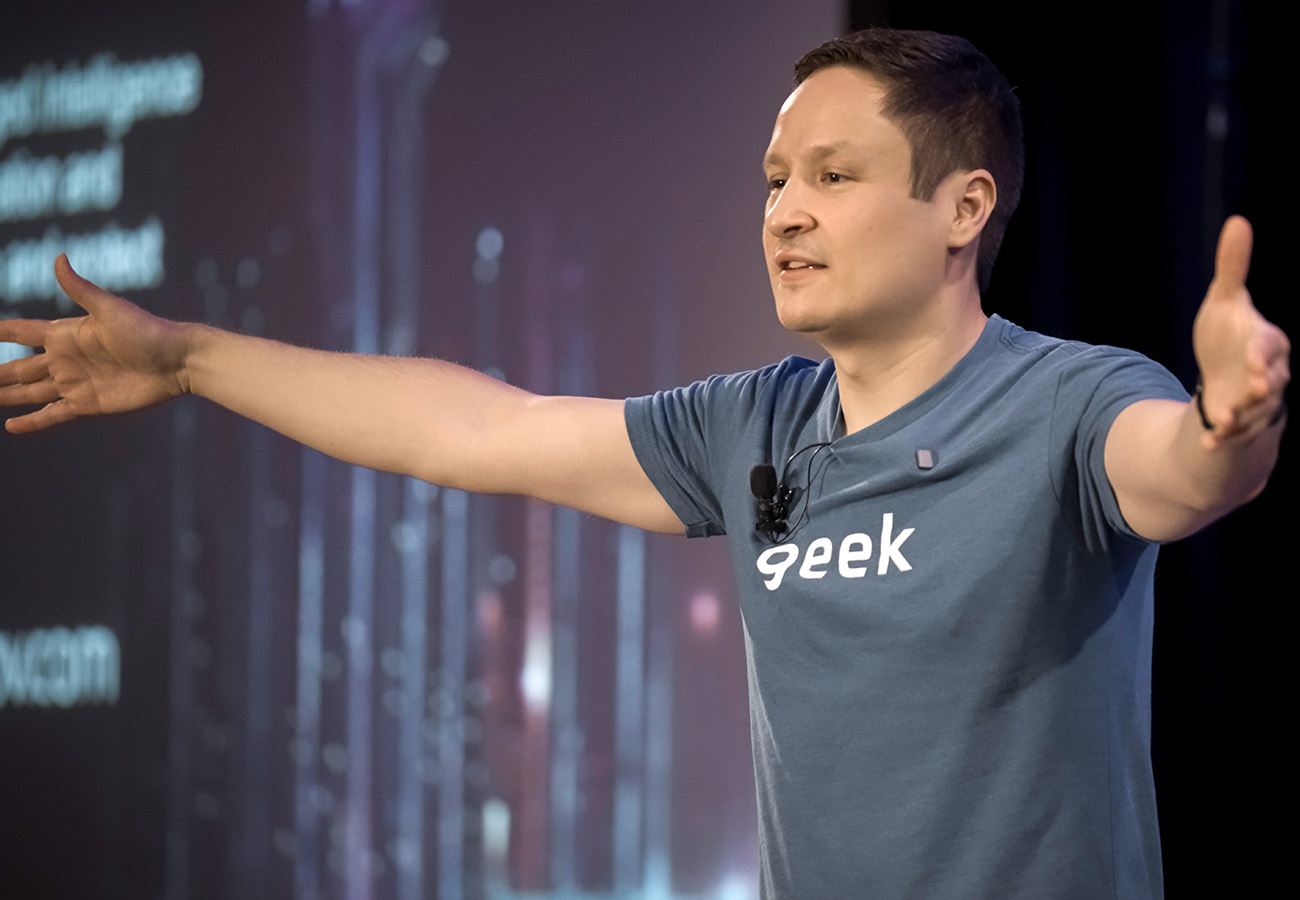 Russ Abdrakhmanov speaking to a crowd in Orlando, Florida